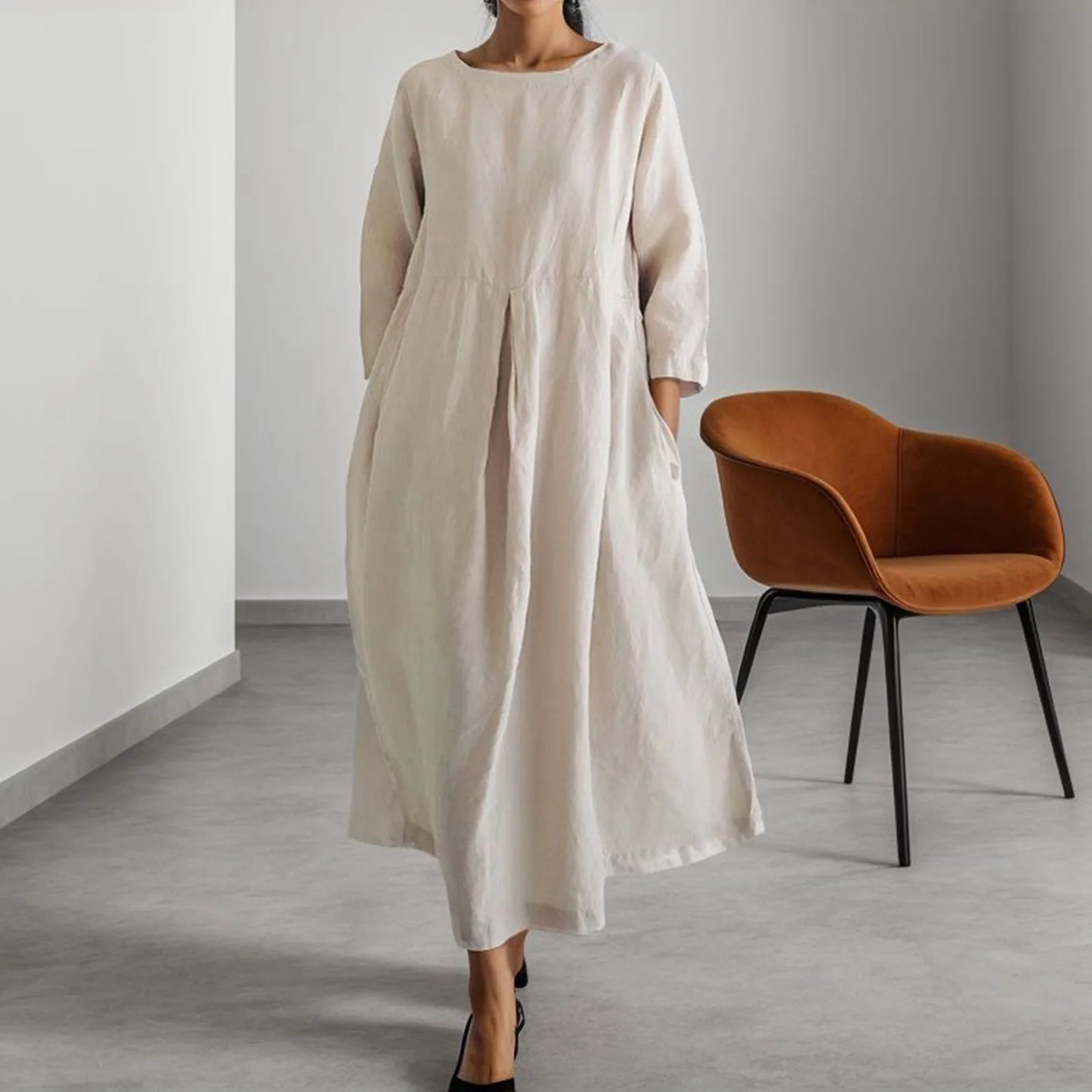 Timeless Elegance: Effortless Neutral Midi Dress in a Modern Setting