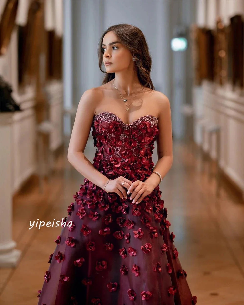 Beautiful Burgundy Dressadorned with Floral Embellishments
