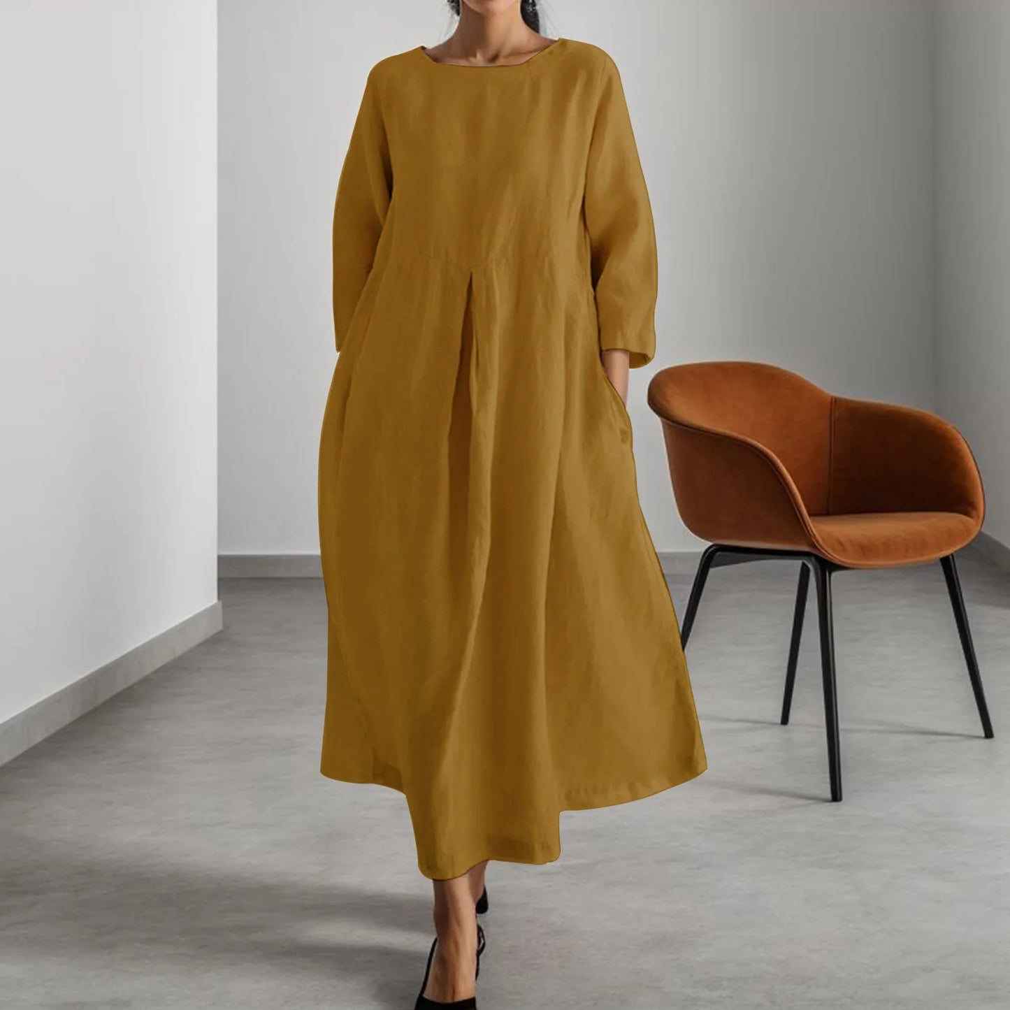 Timeless Elegance: Effortless Neutral Midi Dress in a Modern Setting