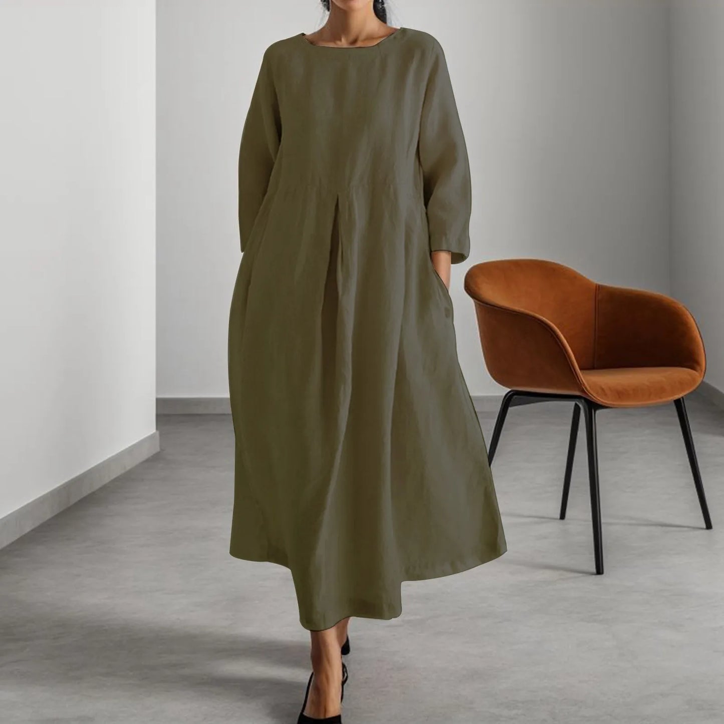 Timeless Elegance: Effortless Neutral Midi Dress in a Modern Setting