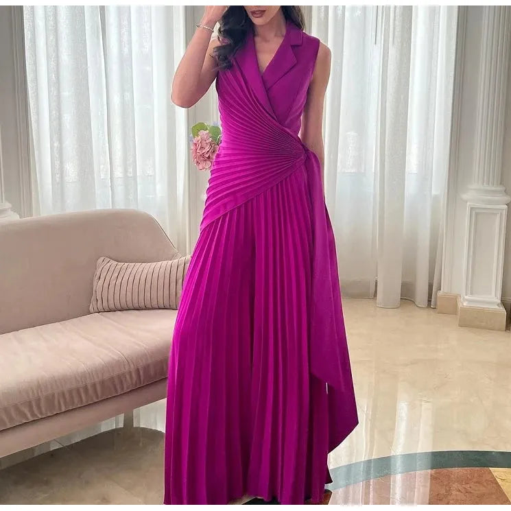 Elegant Blue Pleated Gown Indoors