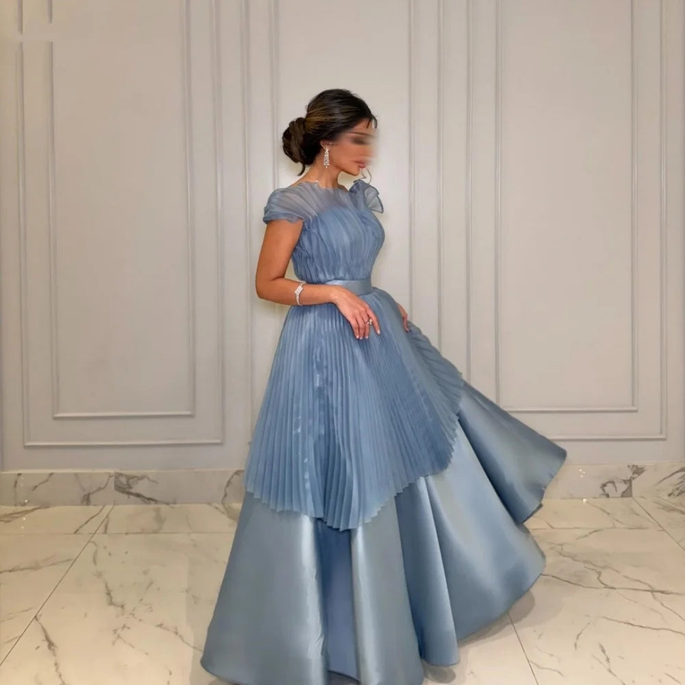 Whispers of Elegance: The Enchanted Blue Gown