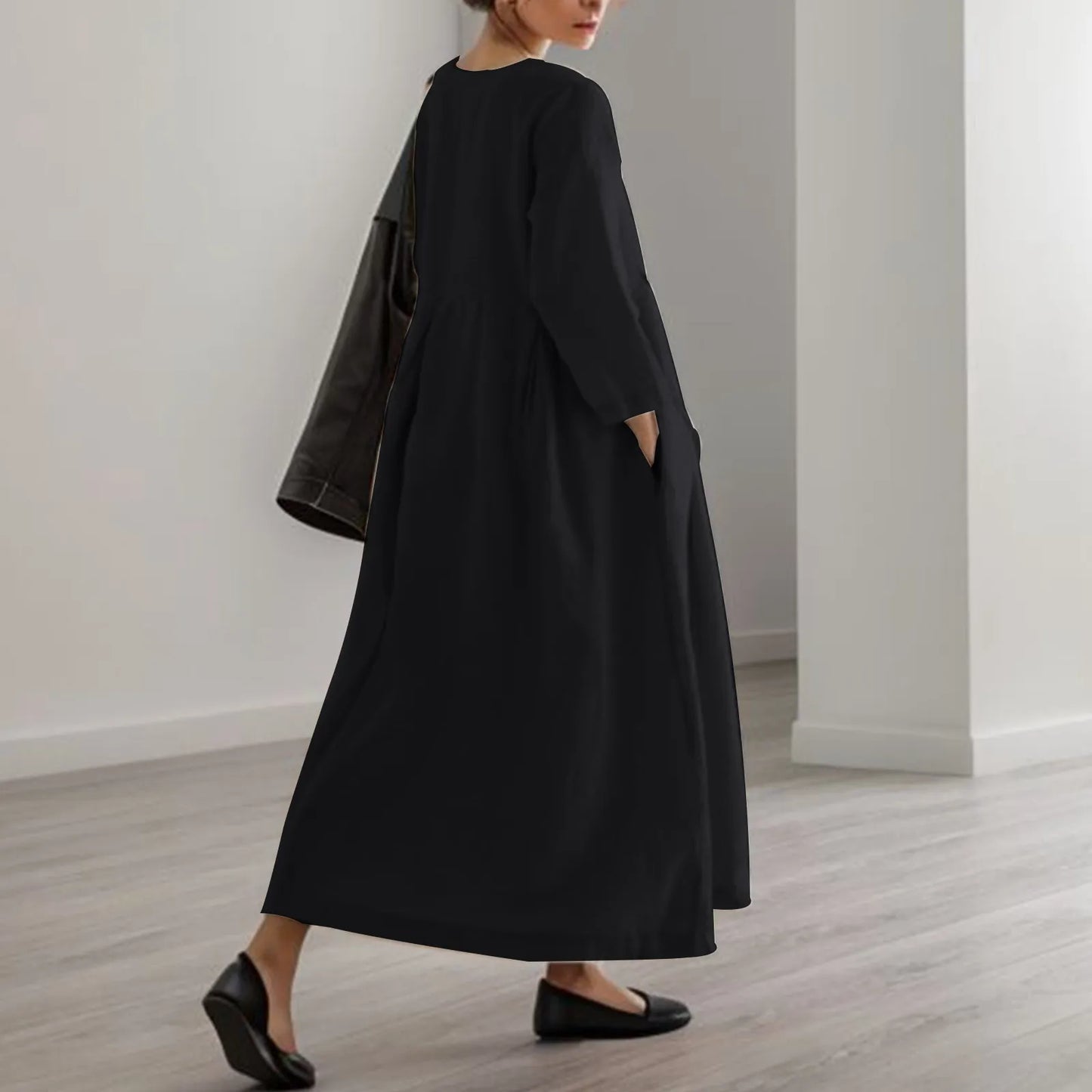 Timeless Elegance: Effortless Neutral Midi Dress in a Modern Setting
