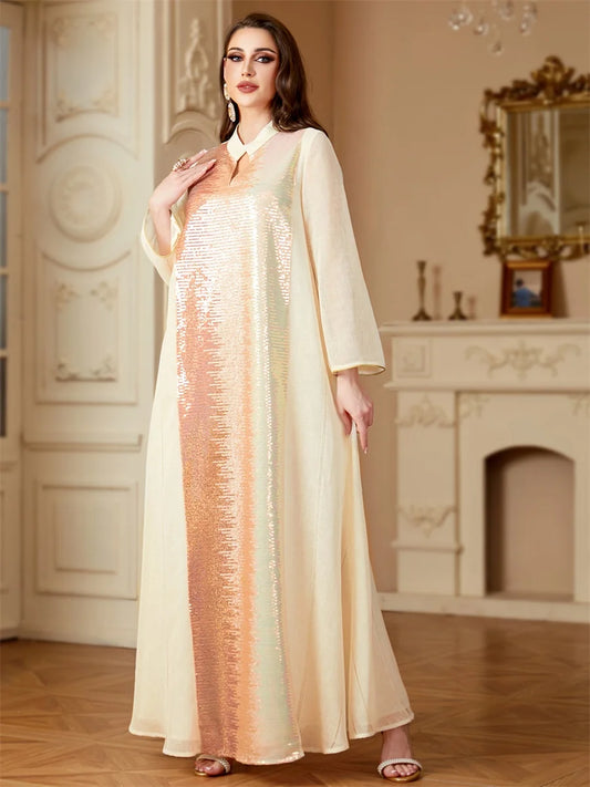 جلابية كريمية فاخرة بتطريز لامع على الواجهة – إطلالة أنثوية براقة