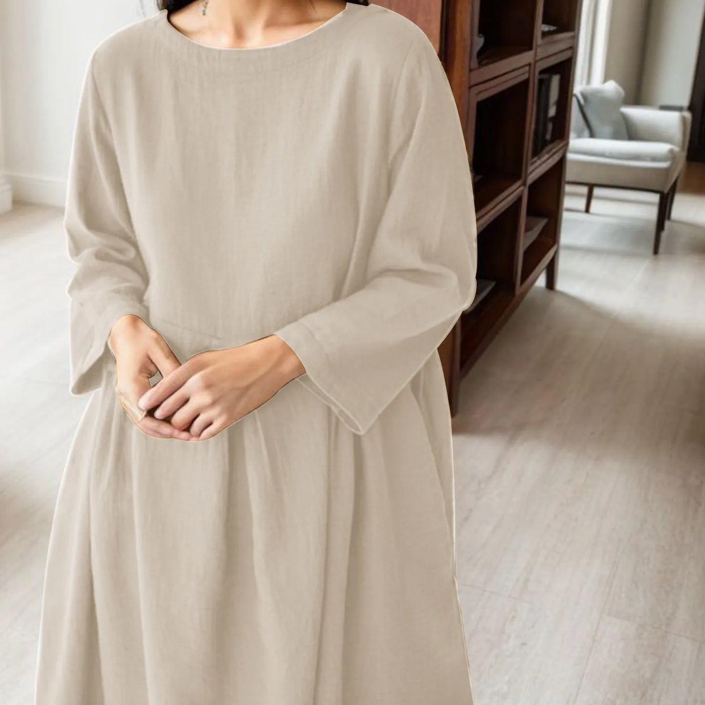 Timeless Elegance: Effortless Neutral Midi Dress in a Modern Setting