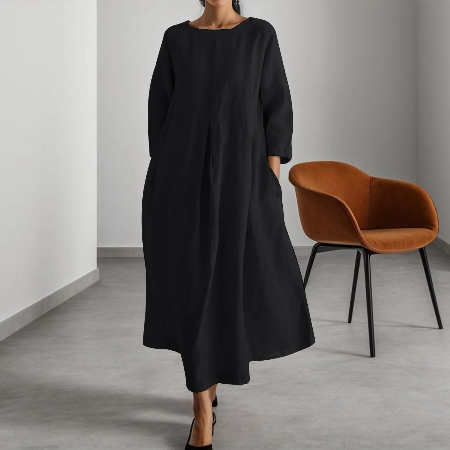 Timeless Elegance: Effortless Neutral Midi Dress in a Modern Setting