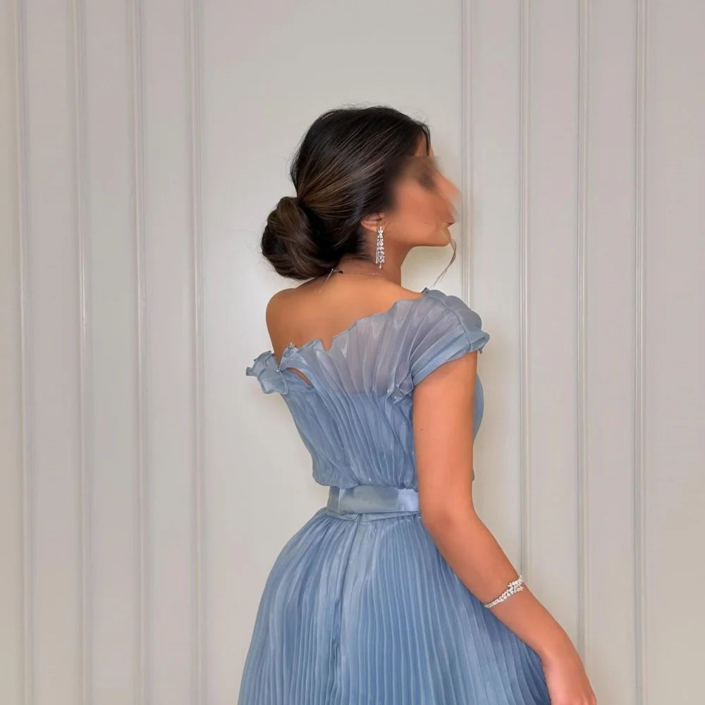 Whispers of Elegance: The Enchanted Blue Gown