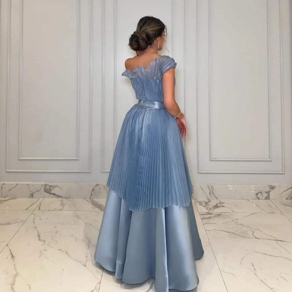 Whispers of Elegance: The Enchanted Blue Gown