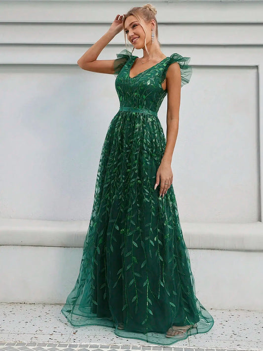 Graceful Woman in a Leaf-Patterned Green Dress