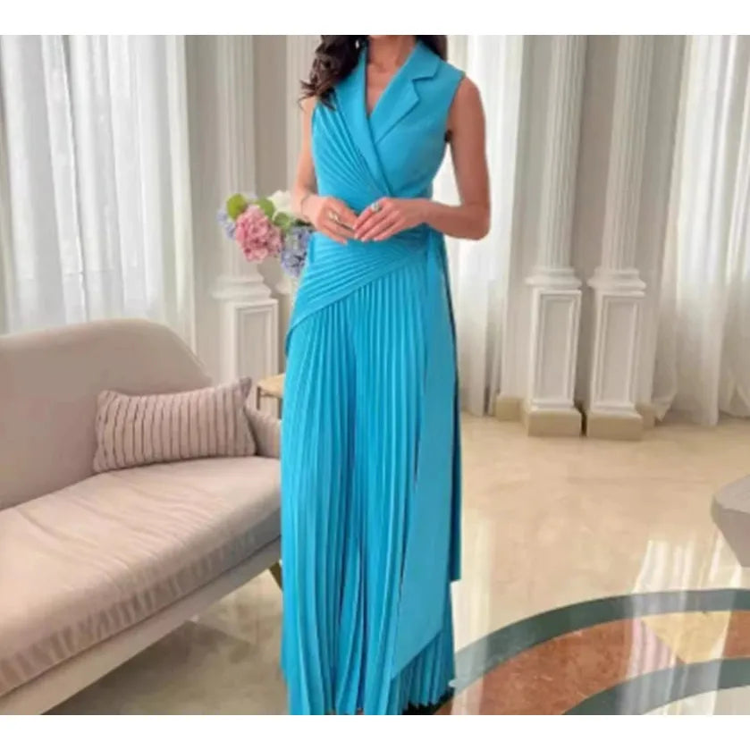 Elegant Blue Pleated Gown Indoors